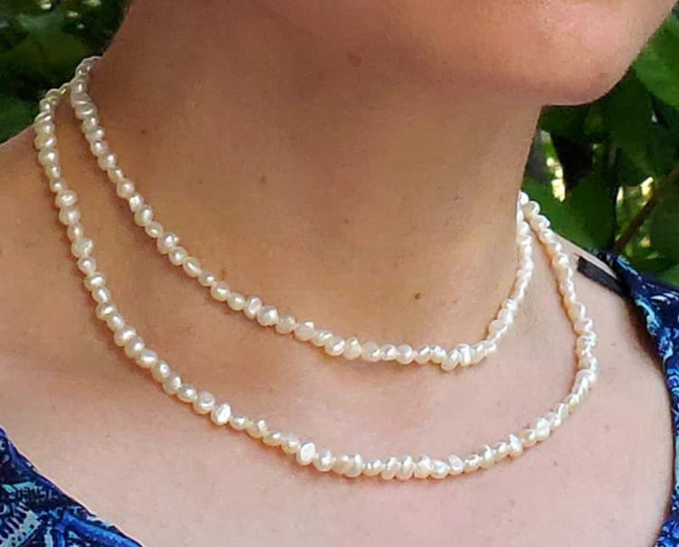 Freshwater Pearl Necklace shown in 34 cm (top) & 39 cm (bottom) in length. (White color)